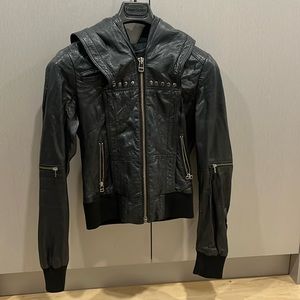Women’s leather bomber jacket. It’s XXS, but fits like XS. Gently worn.